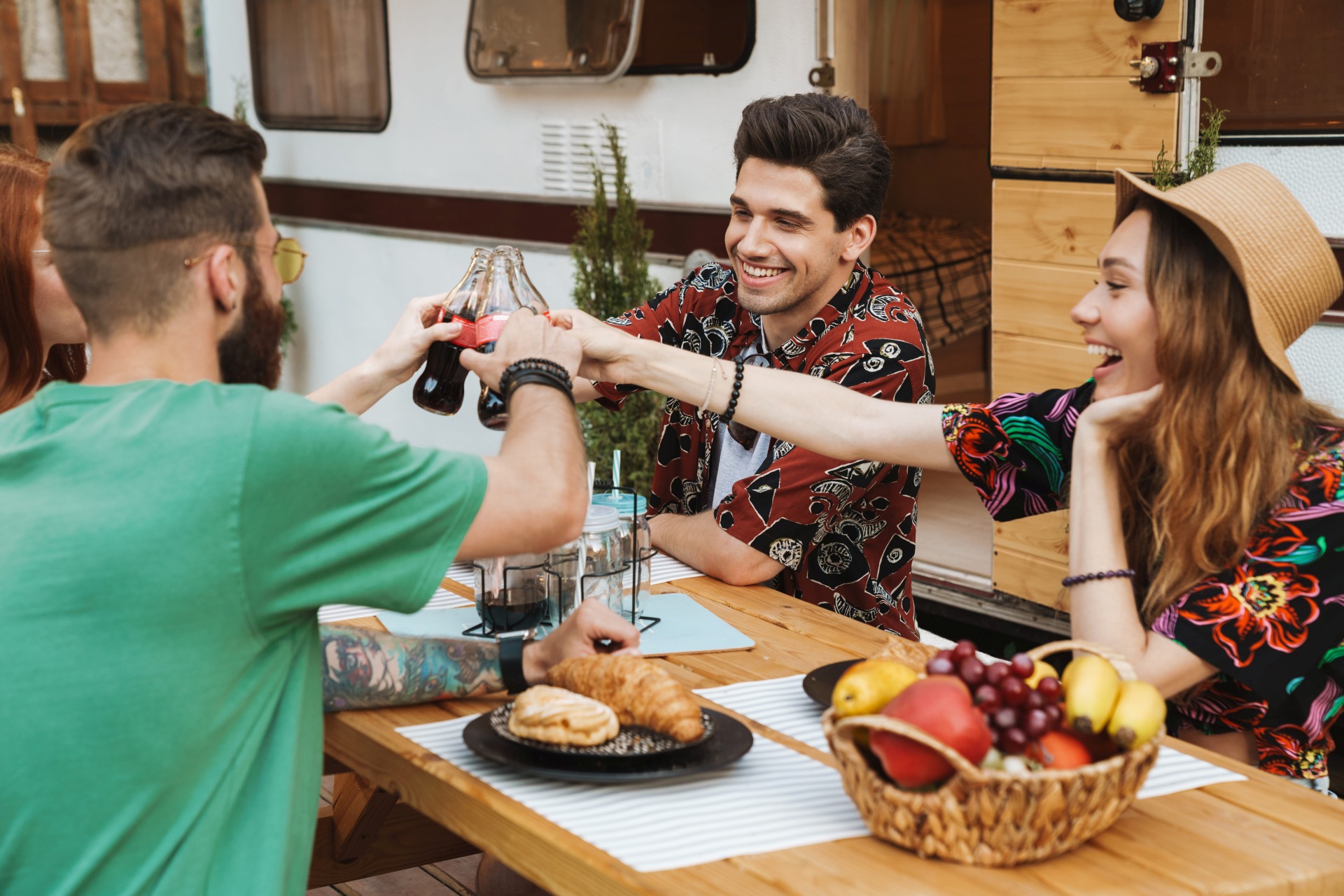 Family enjoying resort-style camping amenities at Camp Landa